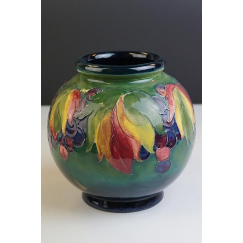 2 - Moorcroft Globular Vase in the Berry & Leaves pattern on a green ground, impressed facsimile signatu... 