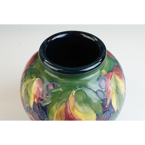 2 - Moorcroft Globular Vase in the Berry & Leaves pattern on a green ground, impressed facsimile signatu... 