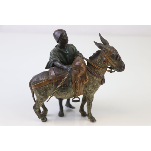 205 - Franz Bergman cold painted bronze of a middle eastern figure with donkey, signed to saddle and numbe... 