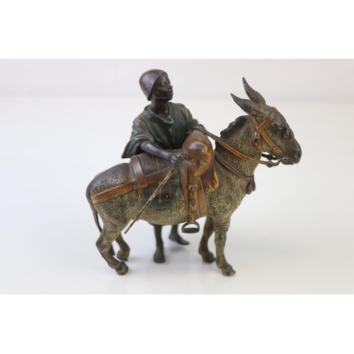 205 - Franz Bergman cold painted bronze of a middle eastern figure with donkey, signed to saddle and numbe... 