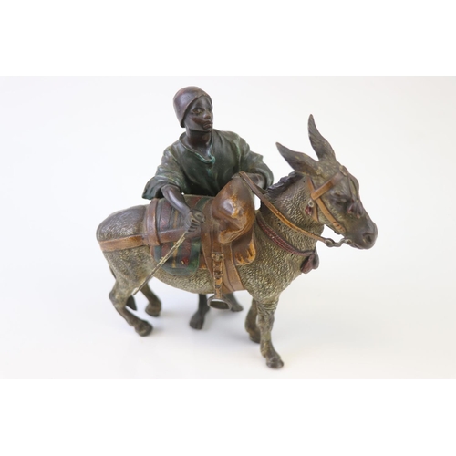 205 - Franz Bergman cold painted bronze of a middle eastern figure with donkey, signed to saddle and numbe... 