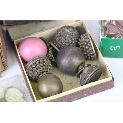 215 - A box of mixed collectables to include scent bottles, marbles and slides.