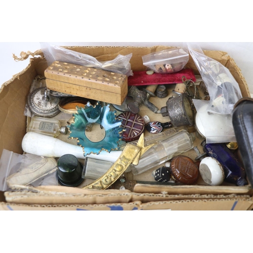 215 - A box of mixed collectables to include scent bottles, marbles and slides.