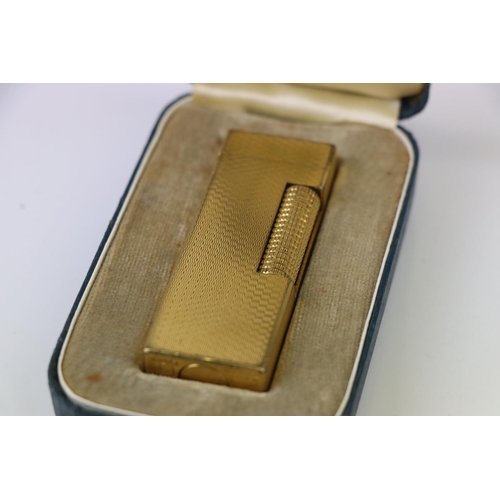 220 - Boxed Dunhill Gold plated Lighter, complete with instruction booklet