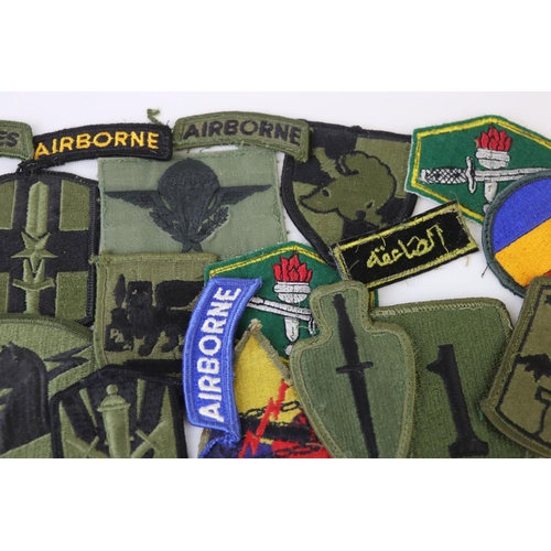 231 - A Collection Of Over 30 Military Cloth Badges, Mainly American and to include Special Forces And Air... 