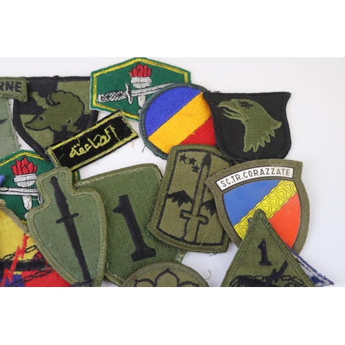 231 - A Collection Of Over 30 Military Cloth Badges, Mainly American and to include Special Forces And Air... 