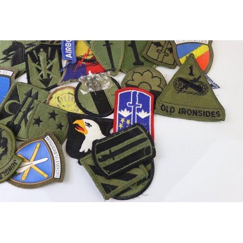 231 - A Collection Of Over 30 Military Cloth Badges, Mainly American and to include Special Forces And Air... 