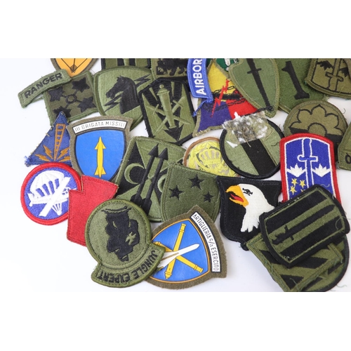 231 - A Collection Of Over 30 Military Cloth Badges, Mainly American and to include Special Forces And Air... 