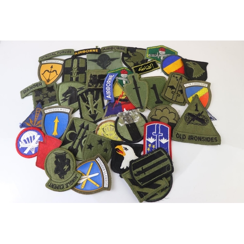 231 - A Collection Of Over 30 Military Cloth Badges, Mainly American and to include Special Forces And Air... 