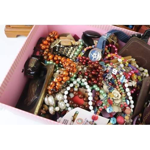 250 - A collection of mainly contemporary costume jewellery contained within three boxes.