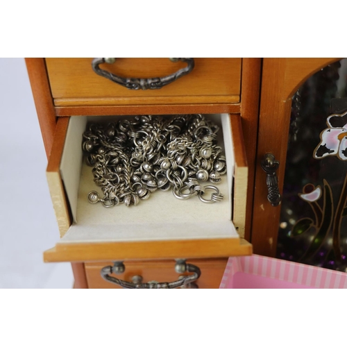 250 - A collection of mainly contemporary costume jewellery contained within three boxes.