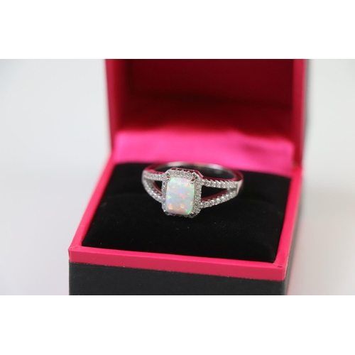 297 - Silver, CZ and Opal paneled Ring