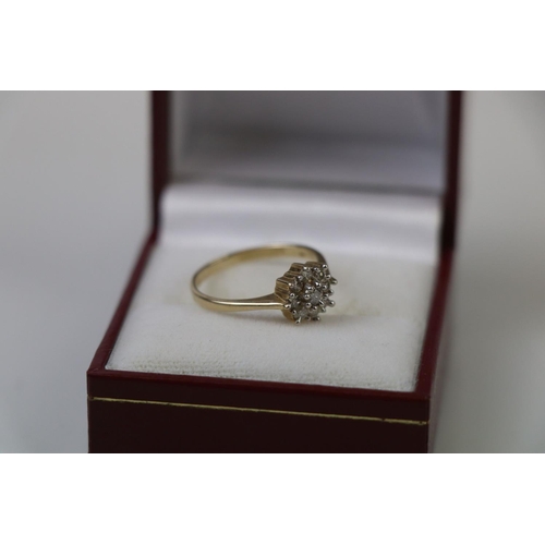 303 - 9ct Yellow Gold Diamond Cluster Ring