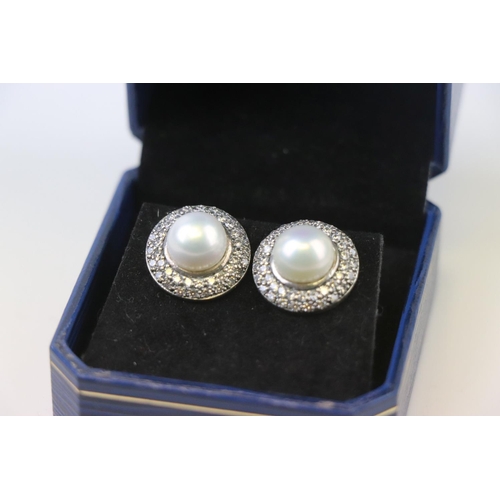 311 - Pair of Silver CZ and Freshwater Pearl Stud Earrings