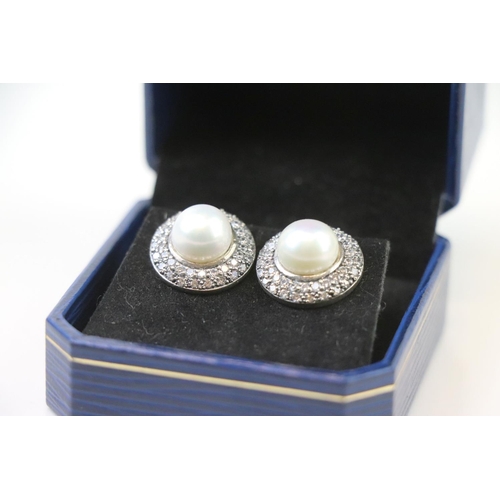 311 - Pair of Silver CZ and Freshwater Pearl Stud Earrings