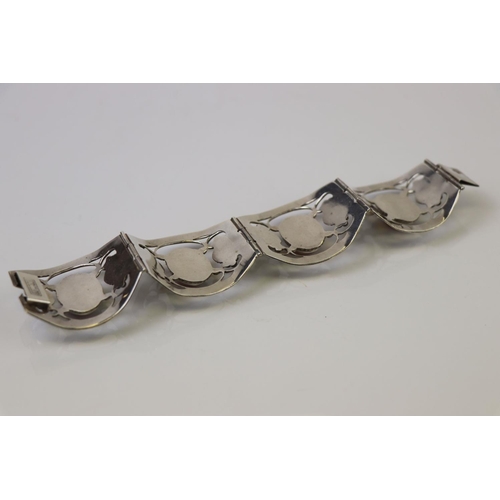 315 - A Mexican 925 sterling silver four panel bracelet.