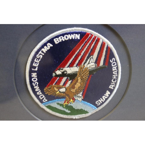 342 - A framed Space Shuttle ephemera group to include singed photo image of Colonel Mark N Brown,image of... 