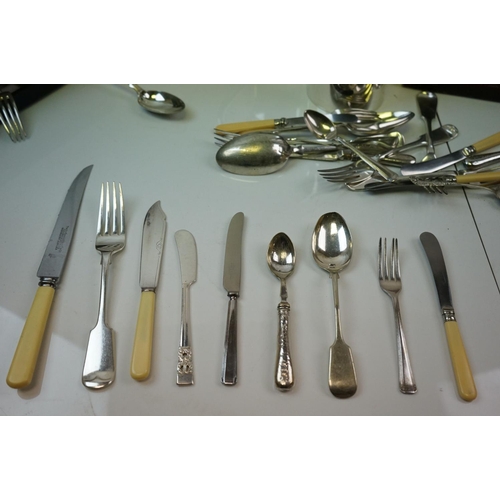 358 - A quantity of silverplate to include tea set and cutlery.