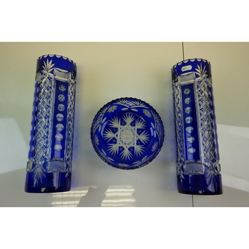 379 - A pair of blue cut glass vases by Val St Lambert together with a similar bowl