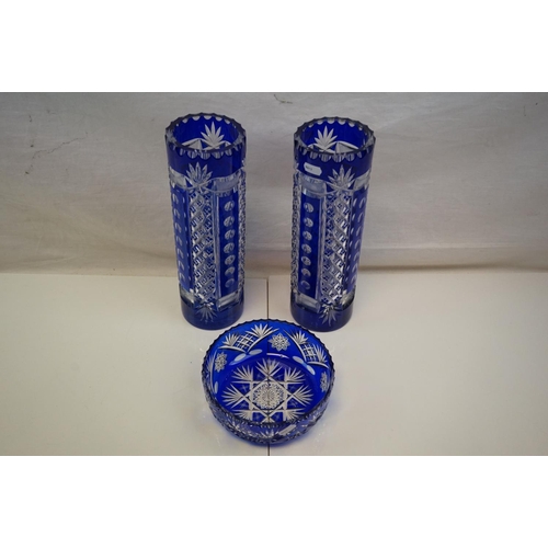 379 - A pair of blue cut glass vases by Val St Lambert together with a similar bowl