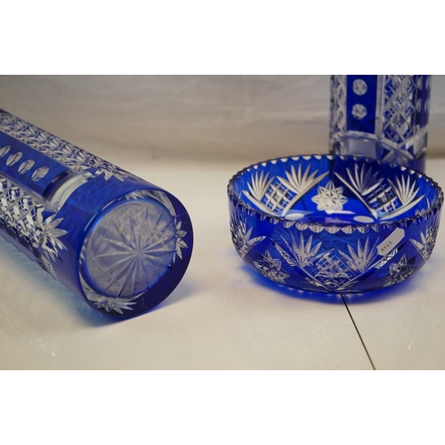 379 - A pair of blue cut glass vases by Val St Lambert together with a similar bowl