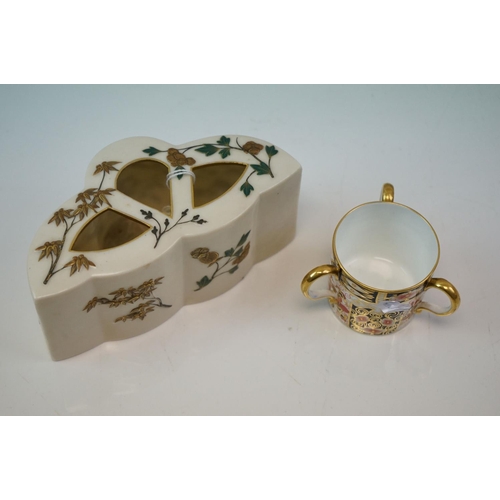 409 - A small three section ceramic posy with gilt decoration and faux Worcester mark to base together wit... 