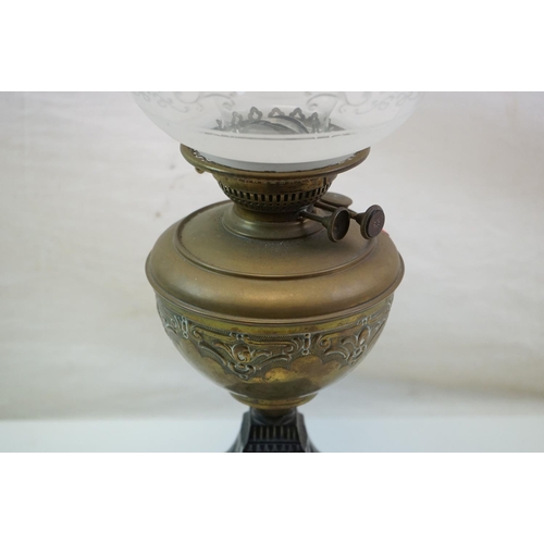 416 - A vintage brass effect oil lamp with shade and chimney,  an hors d'oeuvres triple dish, ceramic shir... 