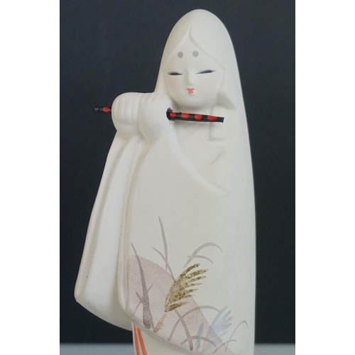 436 - Chinese Figure of a Young Girl playing a Flute in Tradition Costume