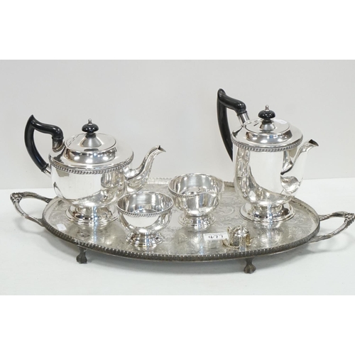 477 - A silver plated oval two handled tray together with a similar teaset etc.