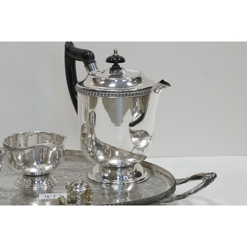 477 - A silver plated oval two handled tray together with a similar teaset etc.