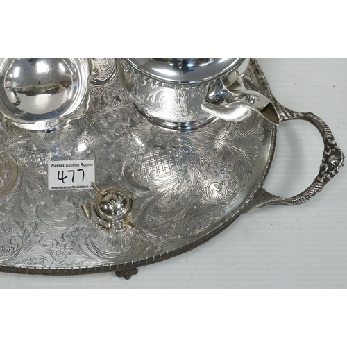 477 - A silver plated oval two handled tray together with a similar teaset etc.