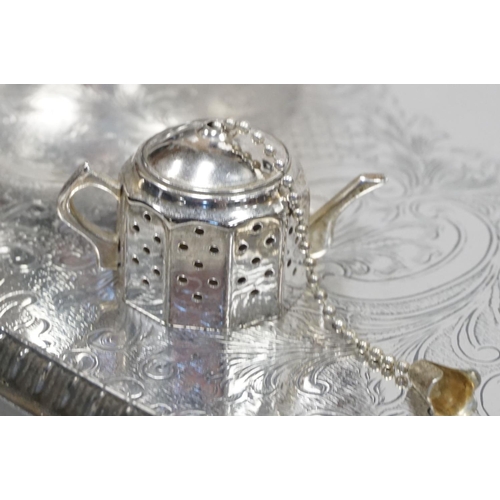 477 - A silver plated oval two handled tray together with a similar teaset etc.