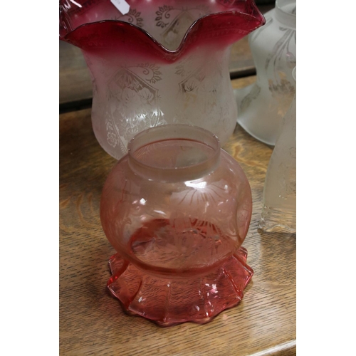 483 - Six antique glass oil lamp shades to include cranberry.