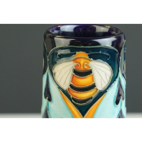 5 - Moorcroft Trial Piece Vase with a bee and thistles pattern, dated 16-9-10, 19cms high
