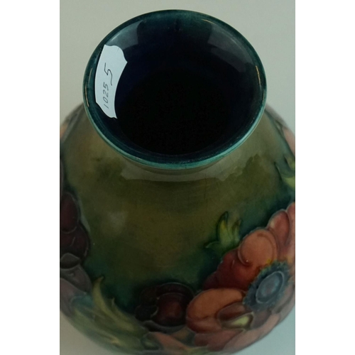 6 - Moorcroft Baluster Vase in the Anemone pattern on a green ground, Moorcroft signature to base and im... 