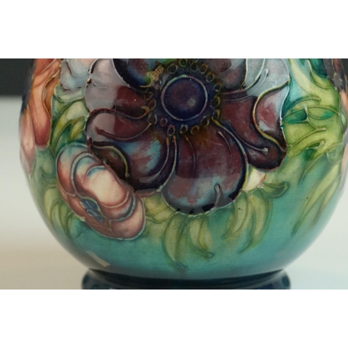 6 - Moorcroft Baluster Vase in the Anemone pattern on a green ground, Moorcroft signature to base and im... 