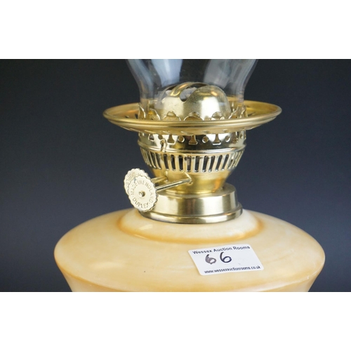 66 - Late 19th / Early 20th century Brass Oil Lamp with a yellow glazed ceramic well decorated with scene... 