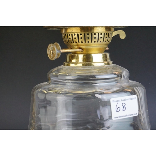 68 - Victorian Oil Lamp with clear glass well and stepped cast iron base, bulbous fluted clear glass shad... 