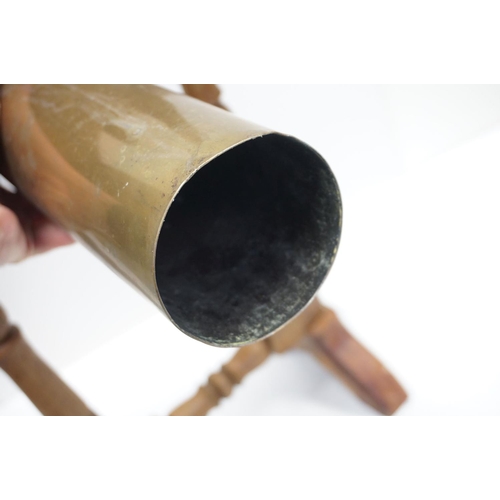 78 - Table Gong formed from a Military Brass Shell dated 1954 held on a Hardwood Frame, 65cms high