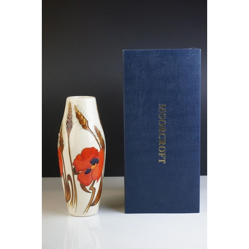 8 - Boxed Moorcroft Vase in the Harvest Poppy pattern, dated 2009, with impressed and painted marks to b... 