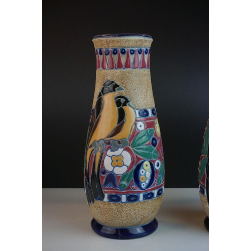 9 - Pair of Amphora Vases of baluster form, painted in coloured enamels with birds and foliage, marked t... 