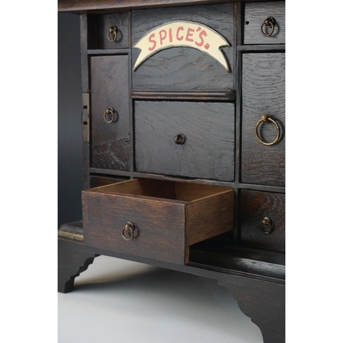 94 - 19th century Oak Spice Cupboard opening to eight drawers