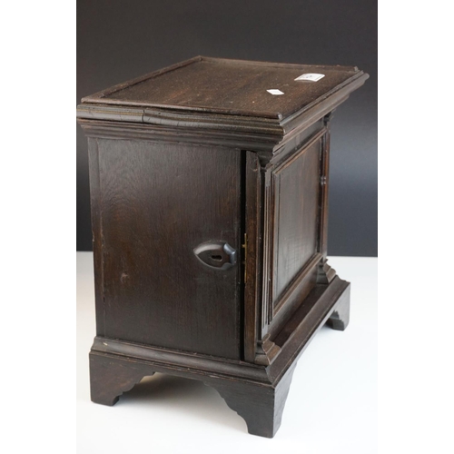 94 - 19th century Oak Spice Cupboard opening to eight drawers