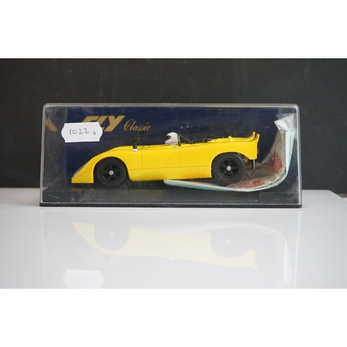 1022 - Four cased Fly Classic slot cars to include C12 Porsche 908 Amarillo, C45 Porsche 908 Flunder Le Man... 