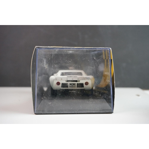 1034 - Five cased / boxed Scalextric slot cars to include C2548 Indy Car plain white, C2472 Ford GT40 plain... 