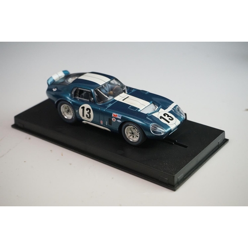 1037 - Two cased /boxed Revell slot cars to include 08372 March 83G Kreepy Krauly #00 and 08352 Shelby Cobr... 