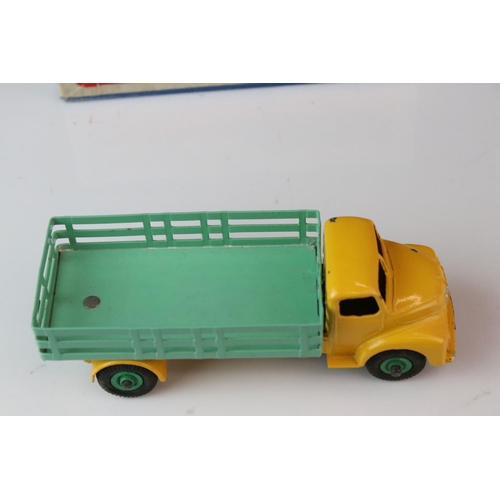 1050 - Two boxed Dinky Supetoys diecast models to include 512Guy Flat Truck in orange cab & chassis and blu... 