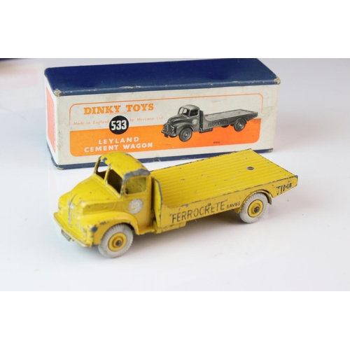 1052 - Two boxed Dinky Supertoys diecast models to include 502 Foden Flat Truck in red (heavy playwear) and... 