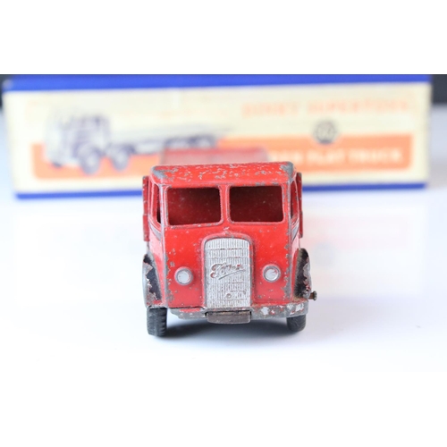 1052 - Two boxed Dinky Supertoys diecast models to include 502 Foden Flat Truck in red (heavy playwear) and... 