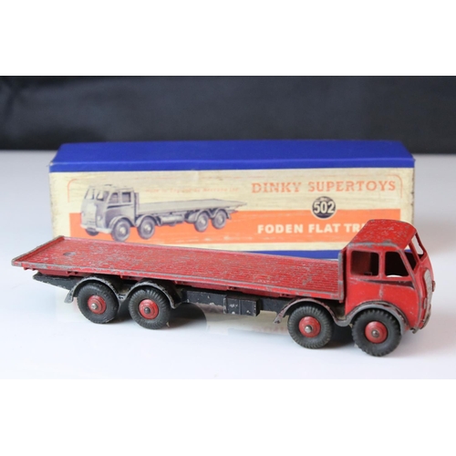 1052 - Two boxed Dinky Supertoys diecast models to include 502 Foden Flat Truck in red (heavy playwear) and... 